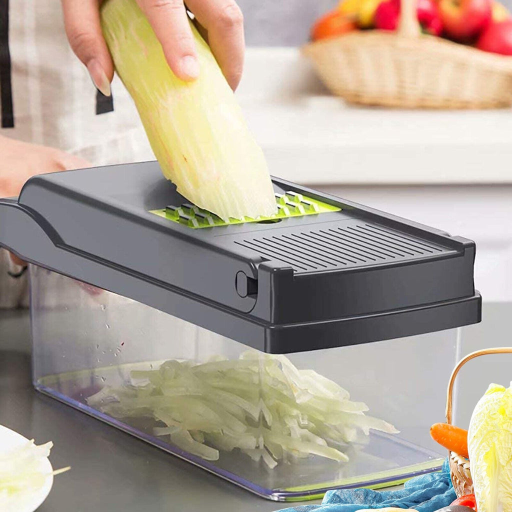 Vegetable being cut using a vegetable cutter.