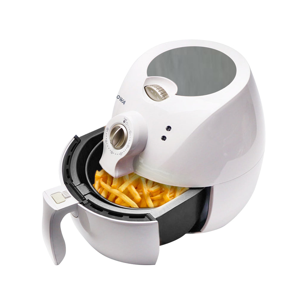 Open compact white air fryer with potato chips.