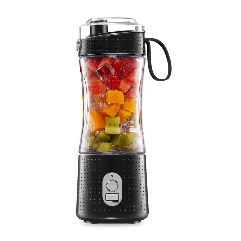 Black portable blender with fruits inside.